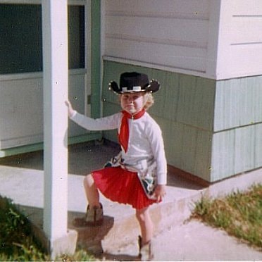 Young AnneMarie dressed as a cowgirl